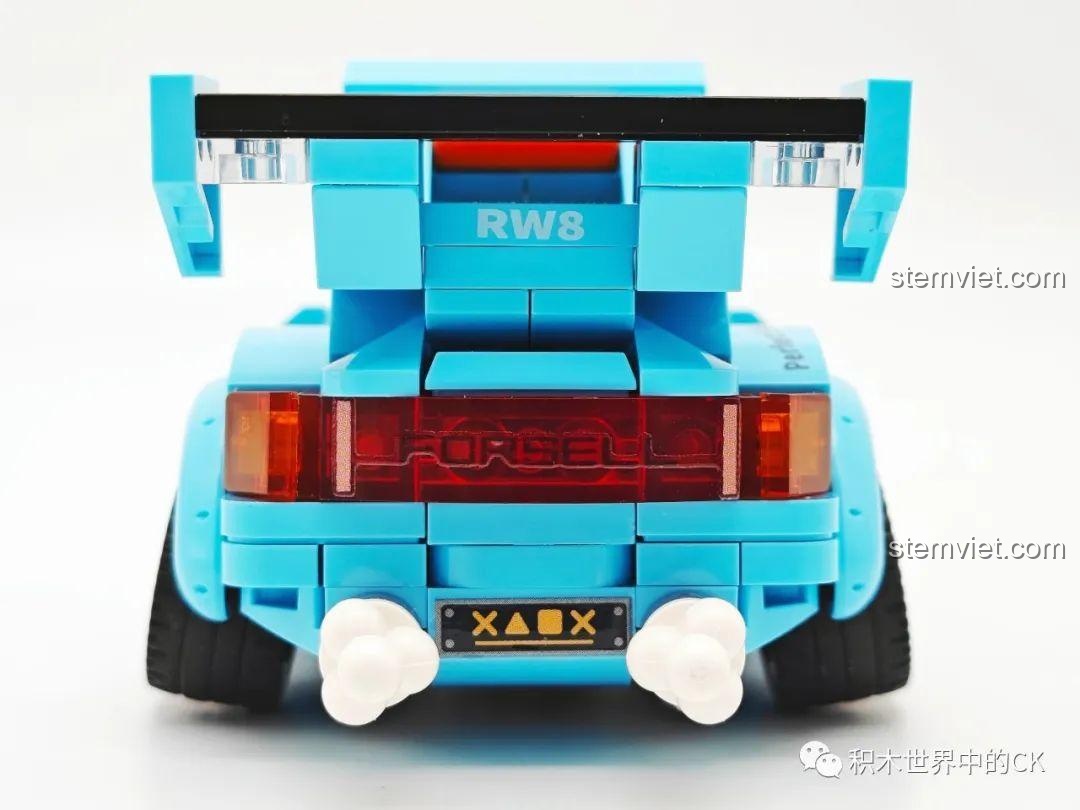 Cận cảnh mặt trước Xe Đua Đáng Yêu SEMBO 714500 màu xanh lam, với thiết kế đèn pha và sọc cam nổi bật.