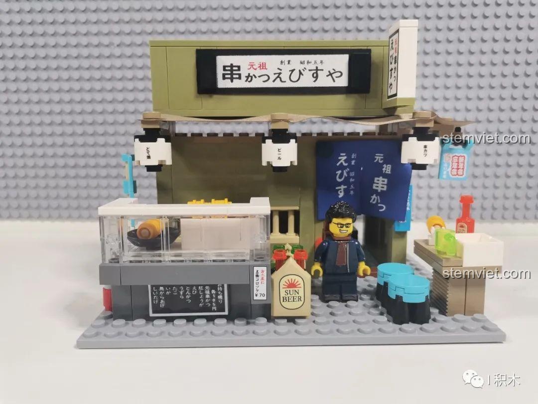 Biển hiệu bia tươi của Kiến trúc đường phố Nhật Bản 73, một điểm nhấn độc đáo, thu hút khách hàng.