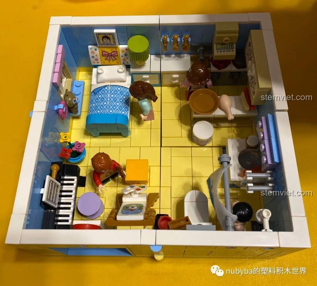 Minifigure bé gái đang sử dụng máy sấy tóc trong phòng ngủ SEMBO BLOCK 601504.