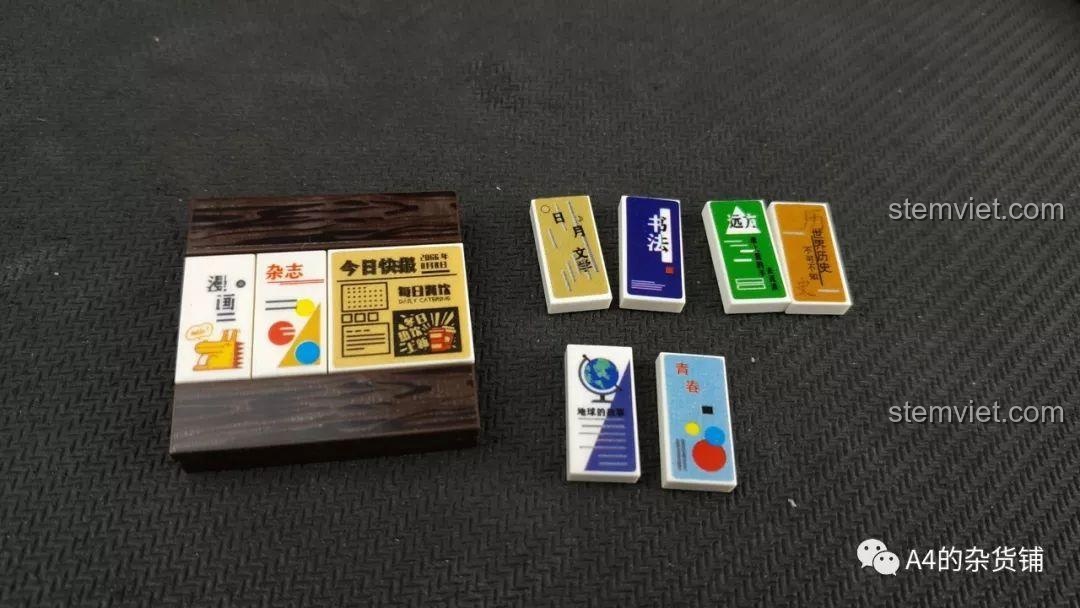 Các tấm sticker mô phỏng sách và tạp chí đa dạng của bộ lắp ráp SEMBO 107015 Hiệu Sách.