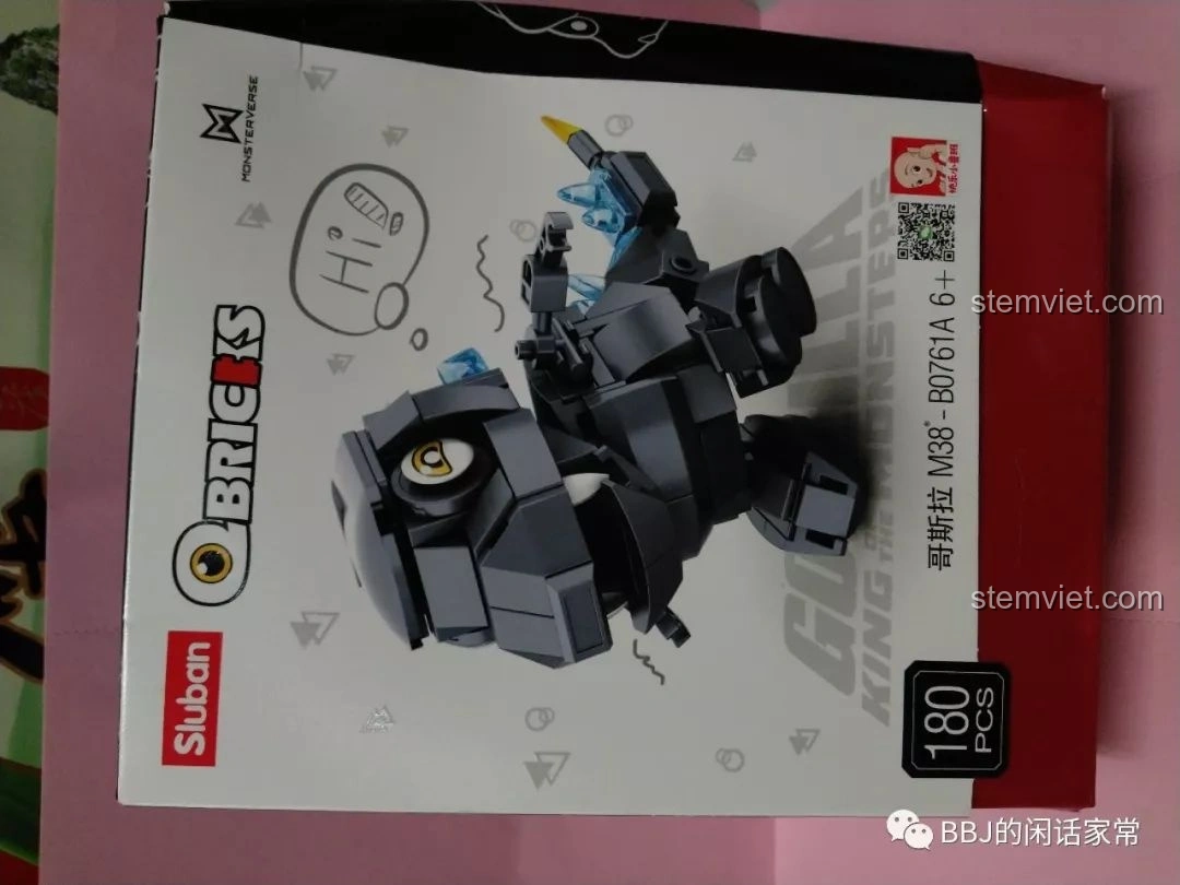 Hộp đồ chơi lắp ráp Sluban B0761A Godzilla chibi M38-B0761A với hình ảnh Godzilla đáng yêu và thông tin 180 mảnh ghép, phù hợp bé 6 tuổi.