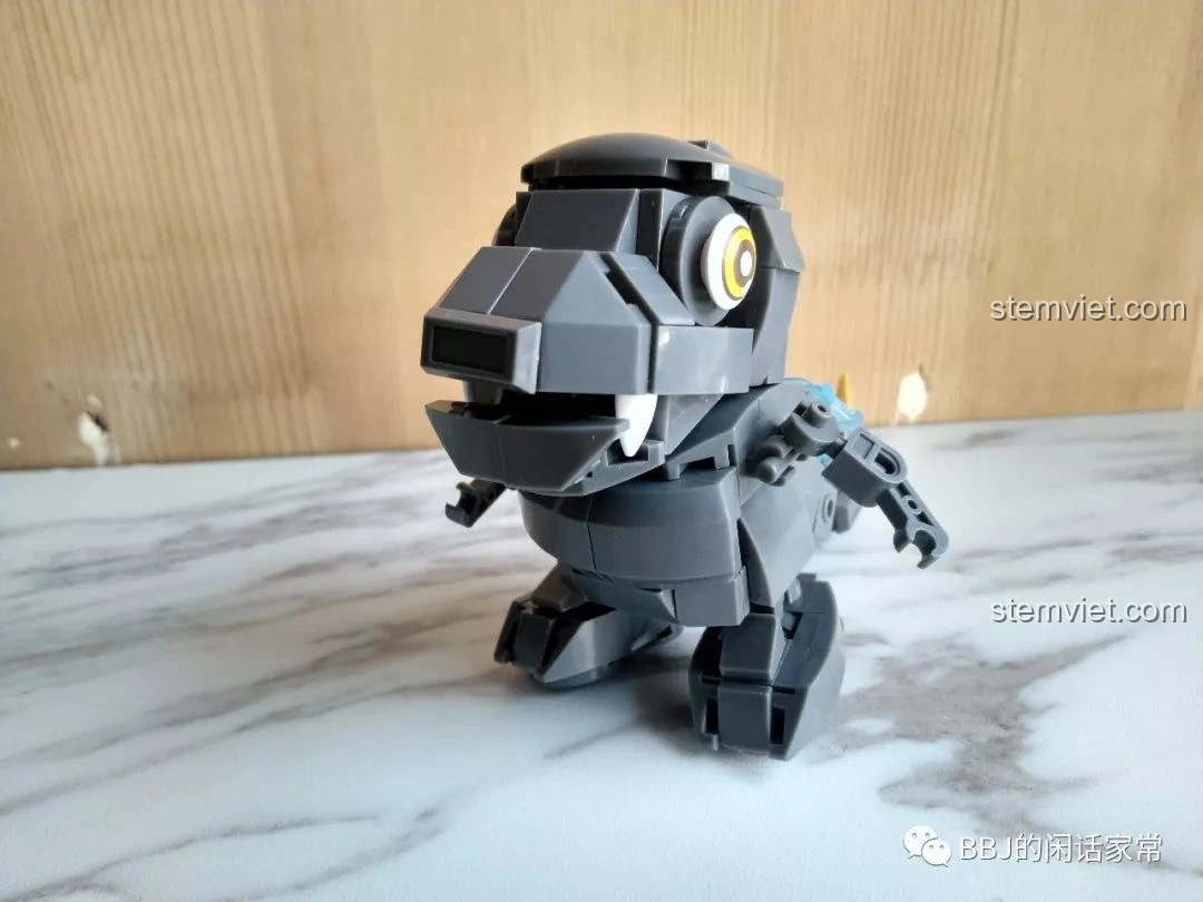 Mô hình Sluban B0761A Godzilla chibi M38-B0761A với bộ mắt thứ tư (nếu có, hoặc góc nhìn khác của mắt).