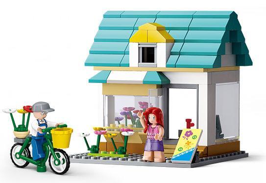 Mô hình hoàn thiện của bộ lắp ghép Cửa Hàng Hoa Của Queenie Sluban M38-B0570, đồ chơi xếp hình tiệm hoa cho bé gái 6 tuổi giá rẻ.