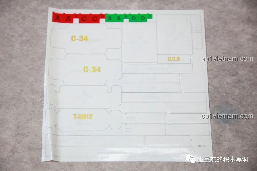 Tờ sticker trong suốt với các ký hiệu và chữ cái đi kèm bộ lắp ghép Xe Tăng Ferdinand Taigao Le T4012, tăng tính chân thực.