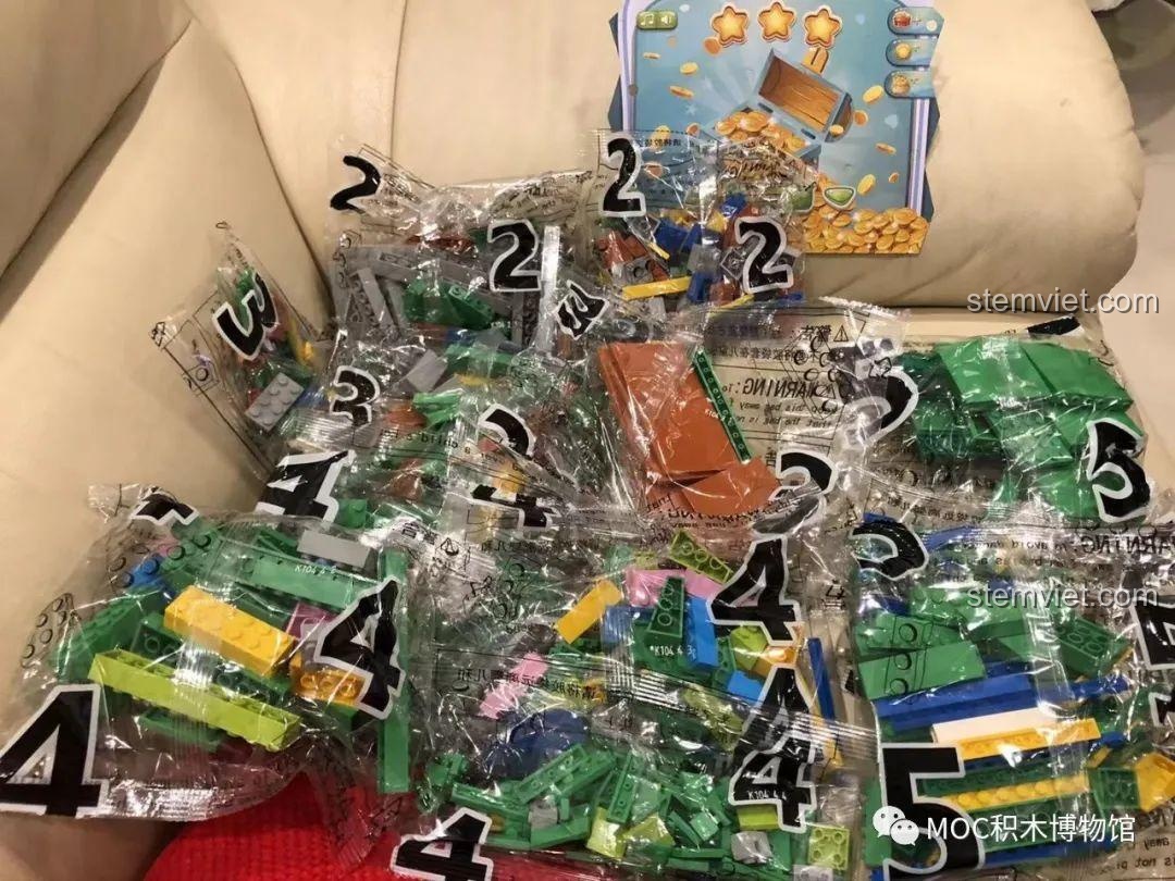 Các túi mảnh ghép được phân loại của bộ lắp ghép Super 18K K104 Máy đẩy xu điện tử, đồ chơi mô hình Máy gắp xu điện tử 2980 mảnh.