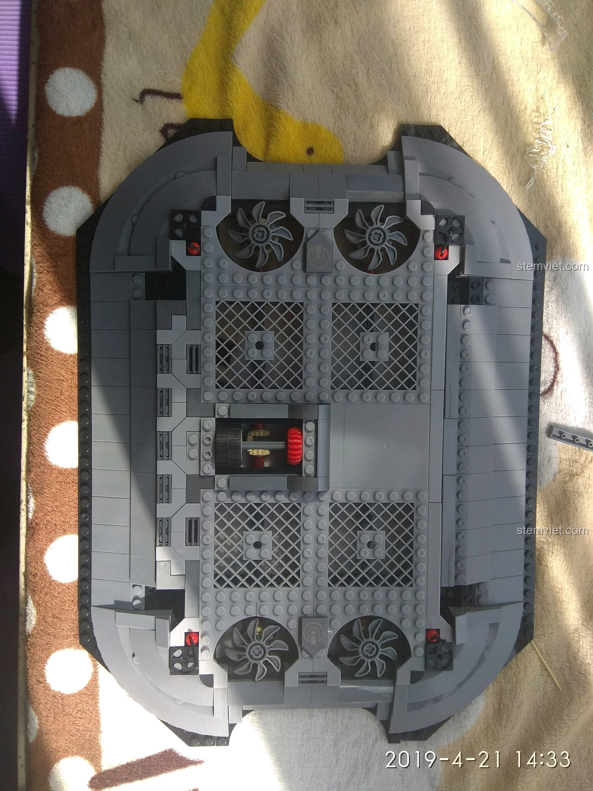 Ảnh review quá trình lắp ráp các chi tiết quạt và động cơ của phụ kiện lắp ráp Bệ đỡ Dũng sĩ Hesman.