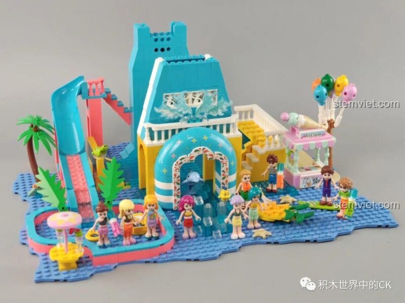 Cận cảnh 4 minifigures nam trong bộ lắp ráp Khu vui chơi nước 5409, với các phụ kiện như súng nước, ván lướt.