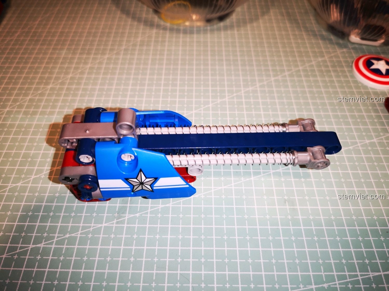 Hoàn thiện cơ chế thanh trượt và lò xo của súng SY 7018C.