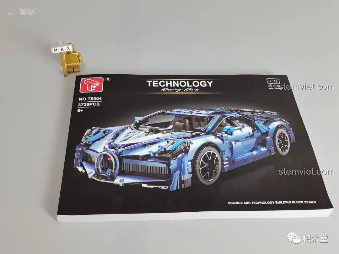 Bên trong hộp bộ lắp ráp Taigaole T5004 Bugatti Divo, hiển thị hai hộp nhỏ bên trong với hình ảnh xe Bugatti Divo. Các túi linh kiện được sắp xếp gọn gàng. Đây là đồ chơi lắp ghép Bugatti Divo chất lượng cao.