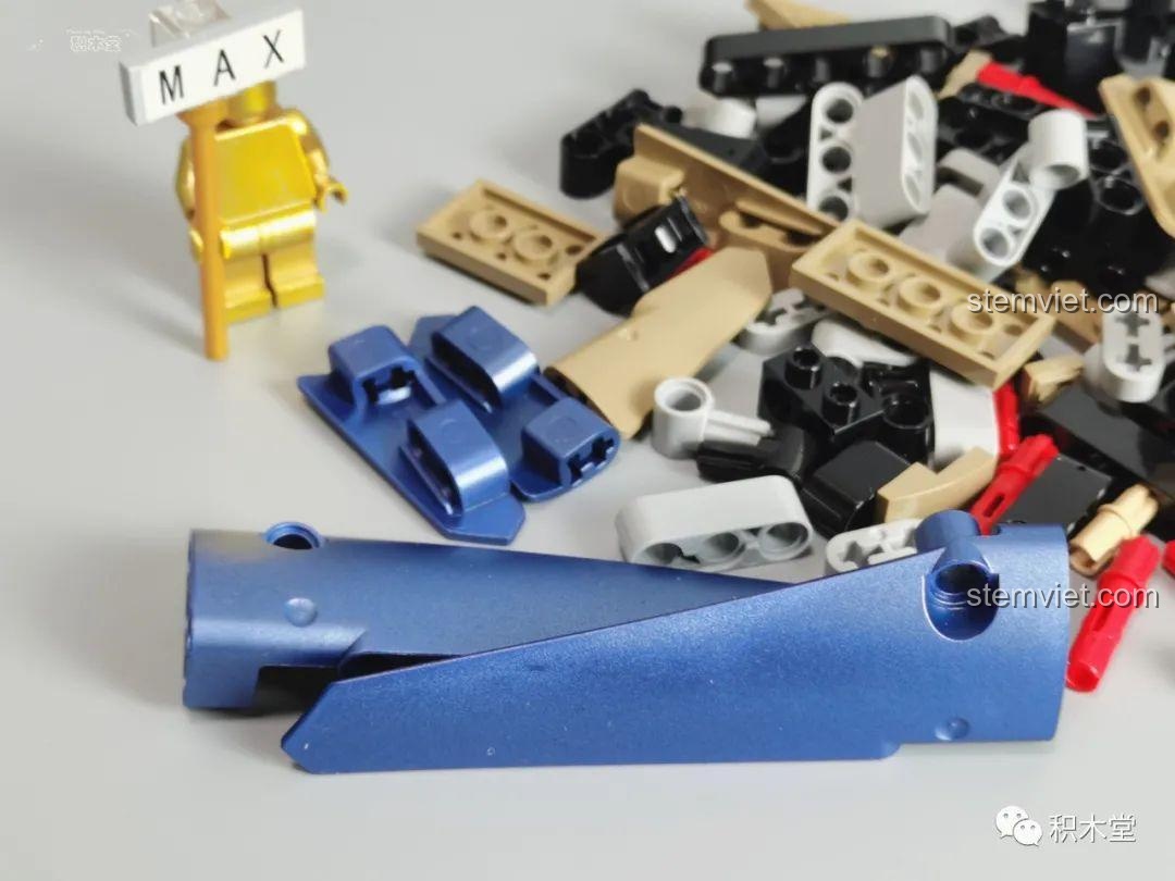 Tổng hợp các linh kiện của bộ lắp ráp Taigaole T5004 Bugatti Divo, bao gồm nhiều loại bánh răng, trục và thanh nối. Đây là bộ lắp ráp T5004 với hệ thống cơ khí phức tạp.