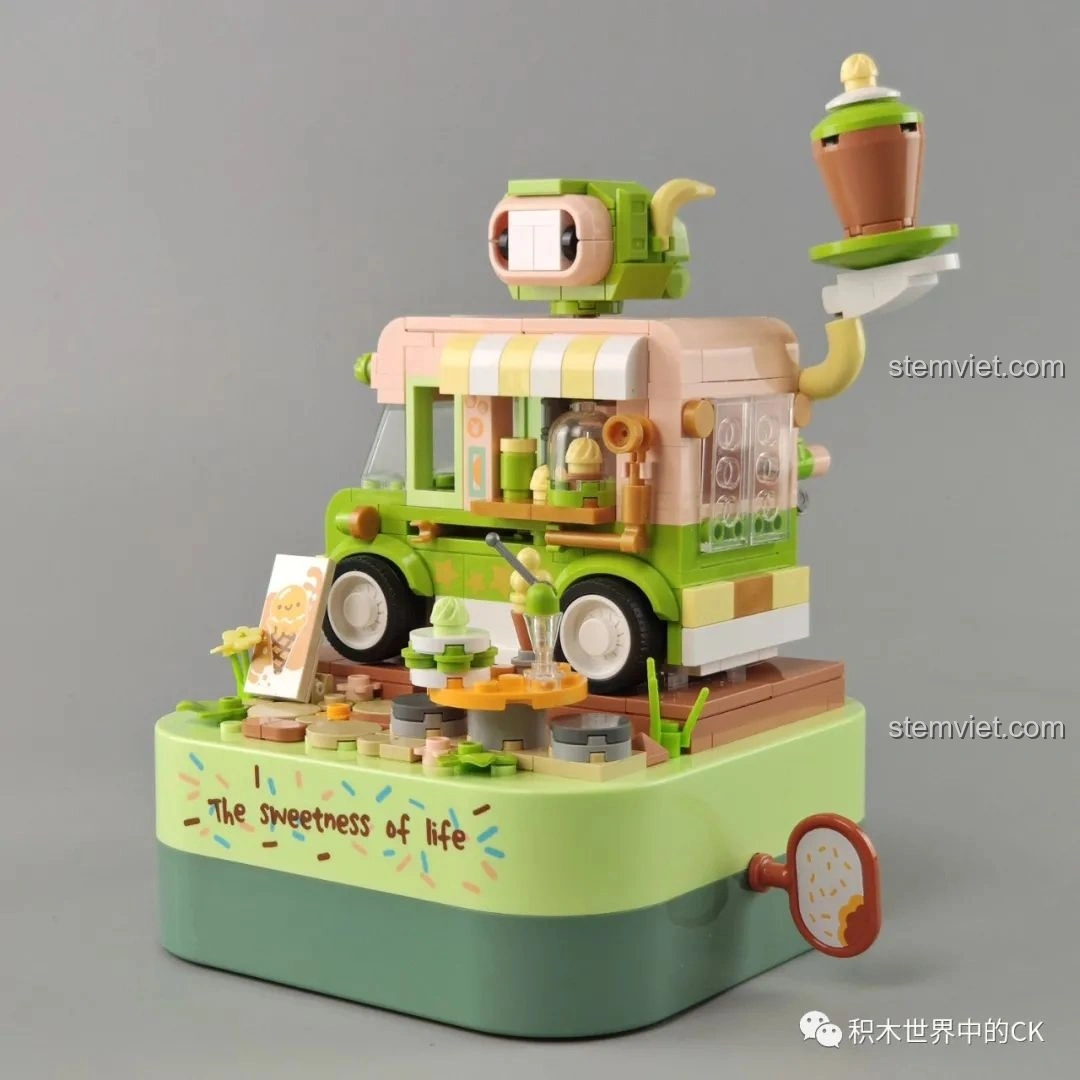 Cận cảnh tay quay hình bánh quy cắn dở của hộp nhạc xe kem ngọt ngào JK1605 JAKI