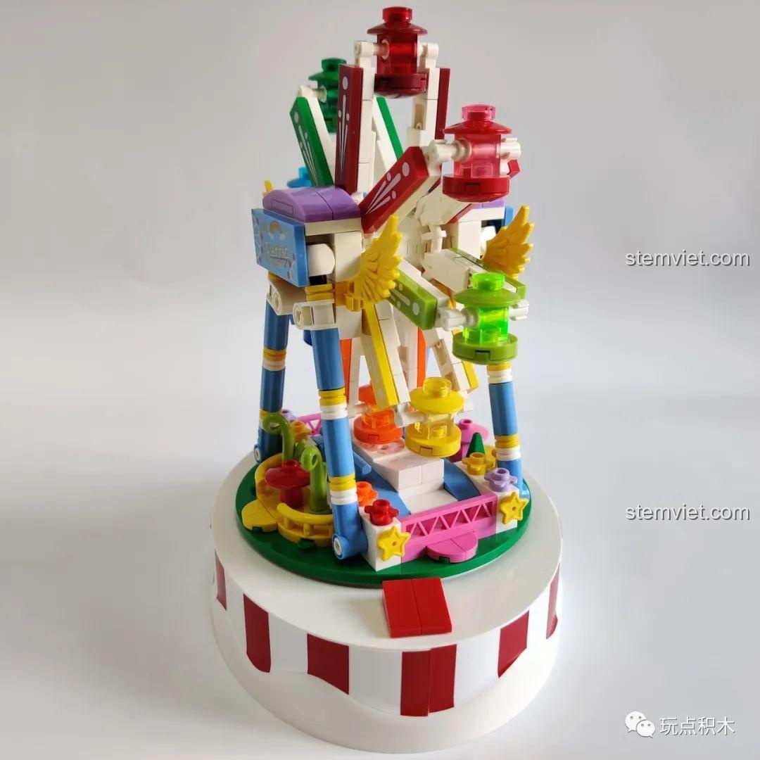 Một góc nhìn khác của mô hình vòng quay WOMA C0366, tập trung vào các chi tiết ở phần đế và trụ đỡ.