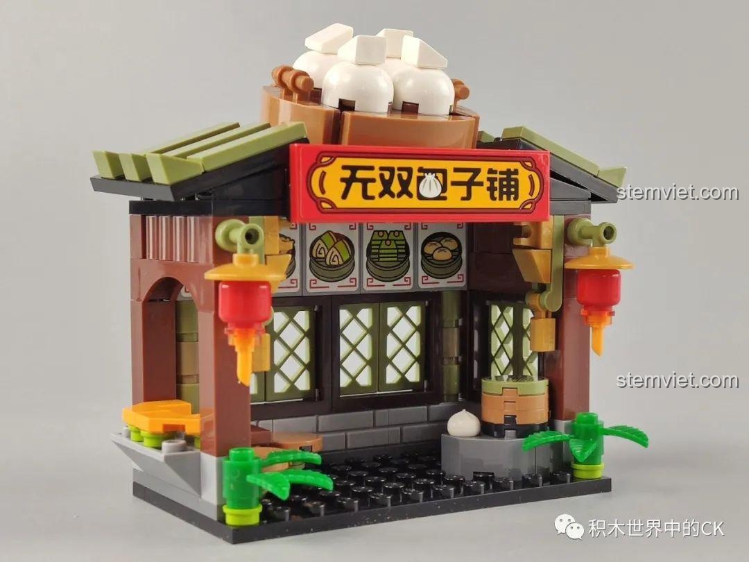 Toàn cảnh mô hình Tiệm Bánh Bao Vô Song QMAN 72012 từ góc nghiêng, thể hiện kiến trúc tổng thể.