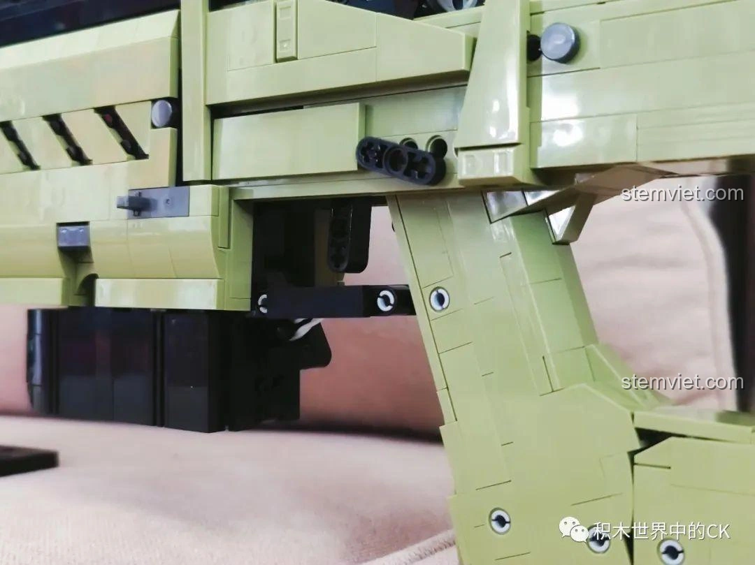 Góc nhìn cận cảnh phần báng súng của mô hình JIESTAR AWP 58022, thể hiện độ hoàn thiện cao.