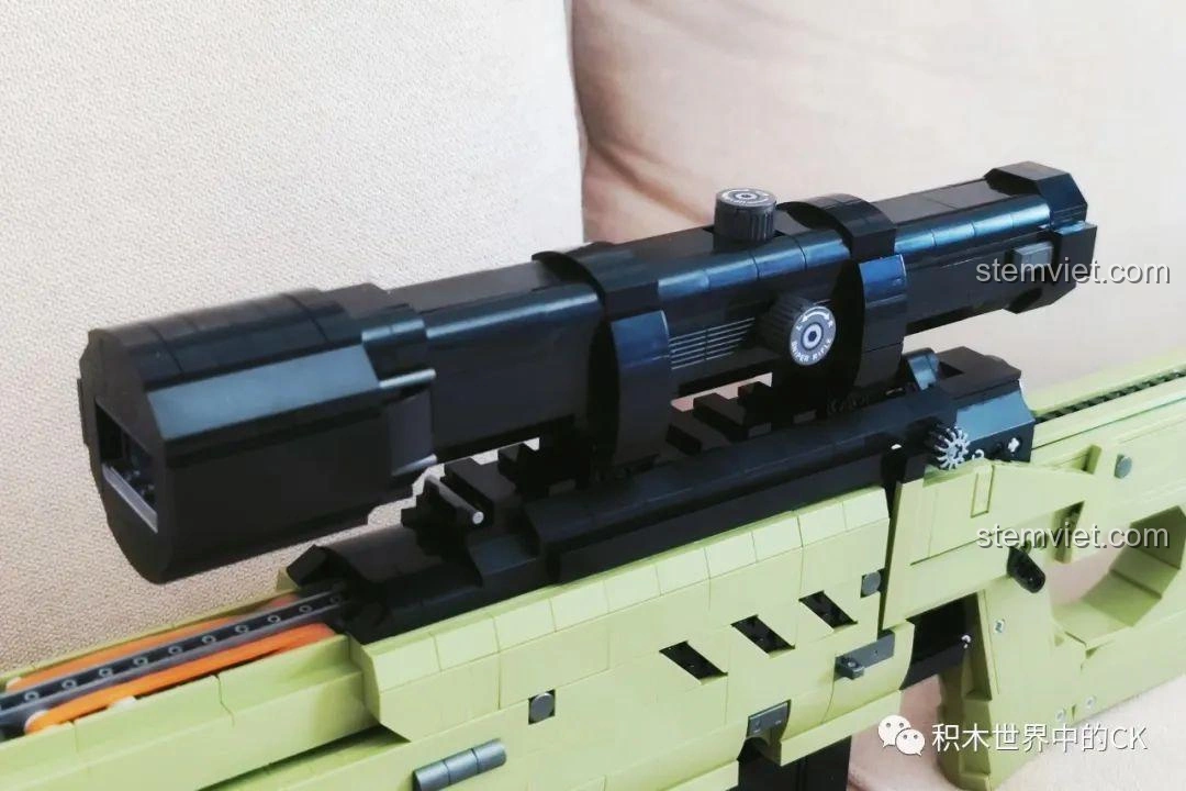 Cận cảnh các nút điều chỉnh trên ống ngắm của mô hình JIESTAR AWP 58022, có thể xoay được.