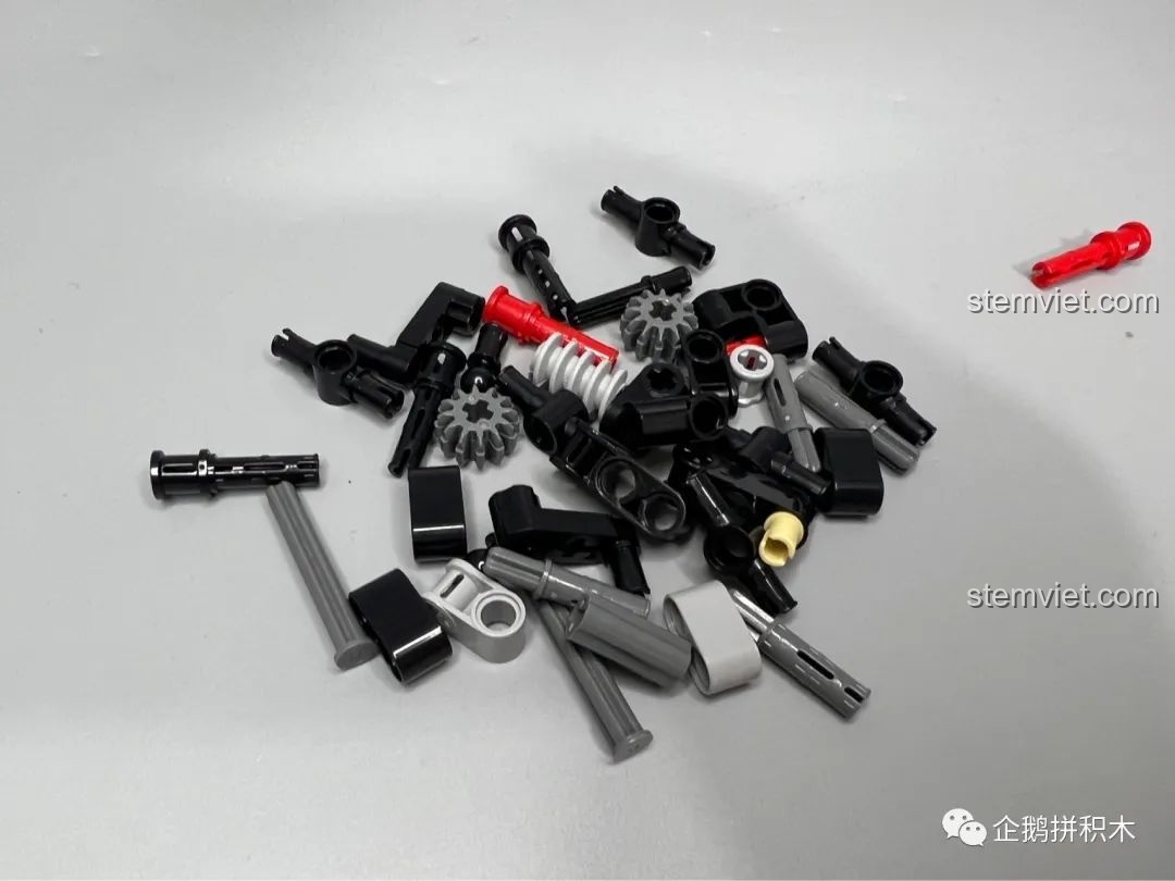 Các chi tiết nhỏ như trục, bánh răng và chốt của bộ lắp ráp Moyu Block MY88008 Bugatti Bolide.