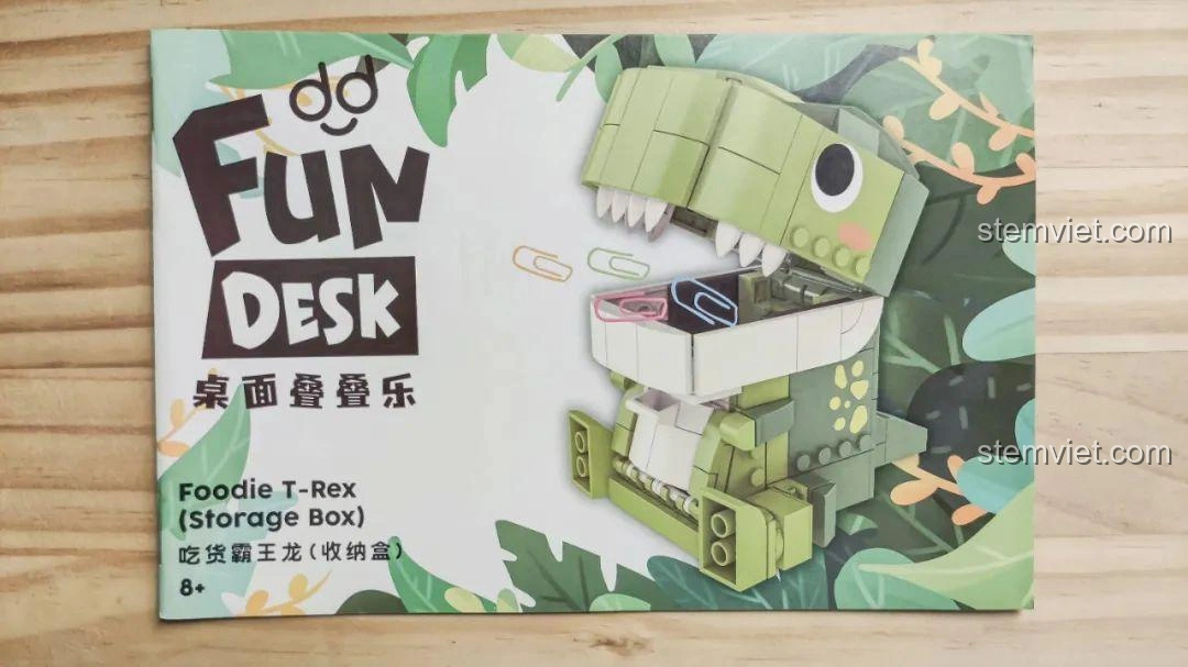 Trang bìa sách hướng dẫn của bộ lắp ghép Khủng long Bạo Chúa Ăn Vặt JAKI JK5102, với hình ảnh T-Rex.