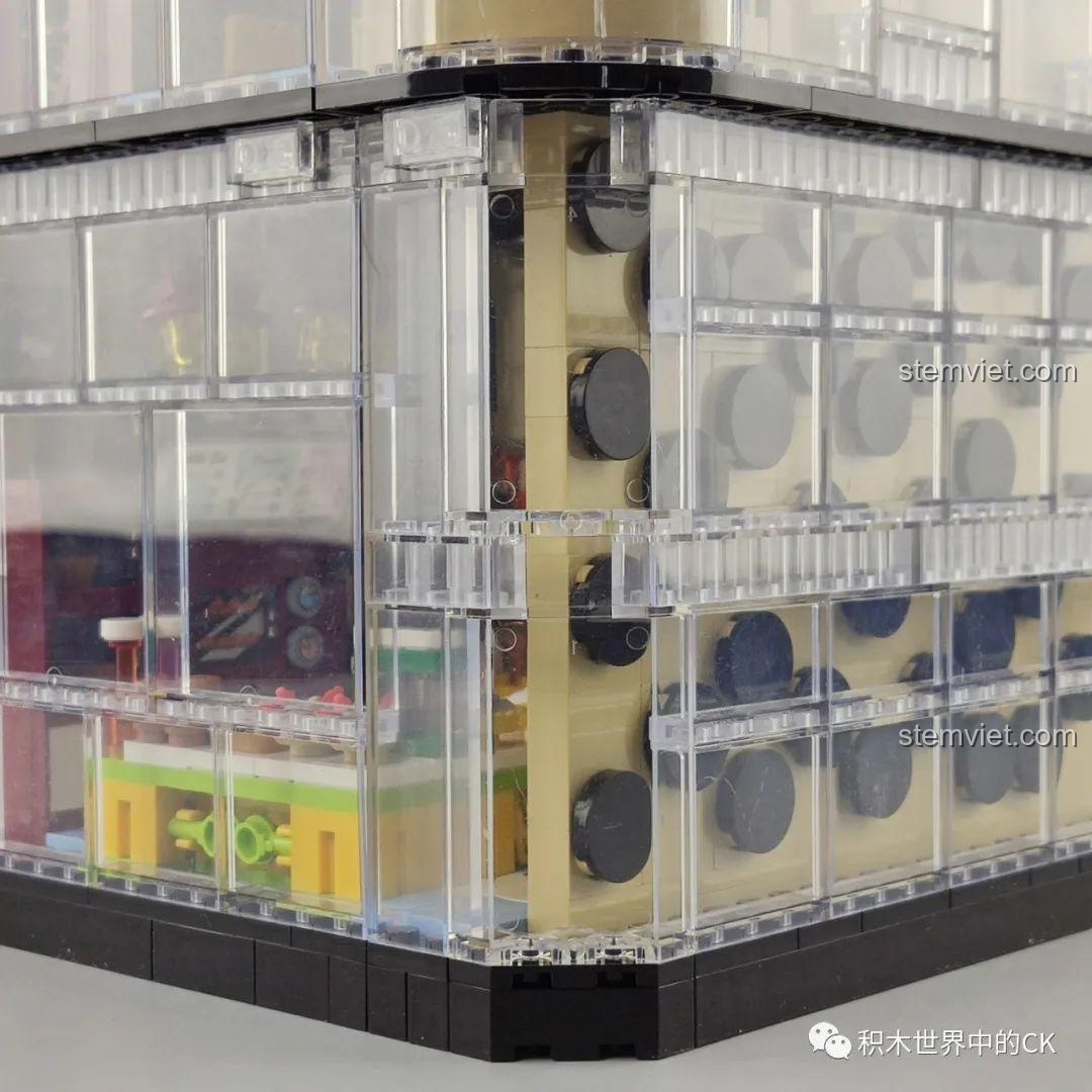 Cận cảnh các bức tường trong suốt của mô hình Cửa hàng trà sữa JIAZHI SY 5209, thể hiện chất lượng mảnh ghép.