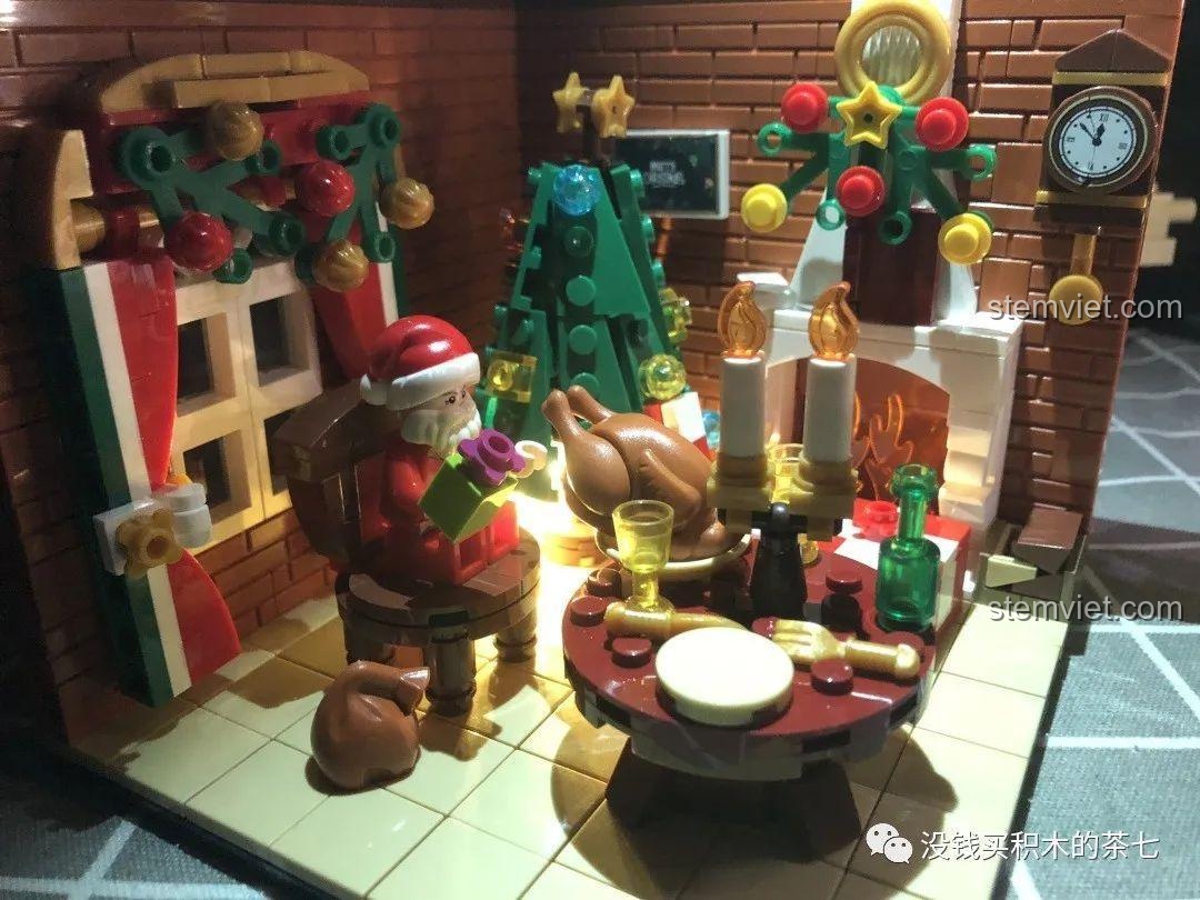 Cảnh Giáng Sinh Ấm Áp Wekki 506118 kết hợp với figure Grogu, tạo nên một khung cảnh độc đáo, bộ đồ chơi lắp ráp cho bé 6 tuổi.