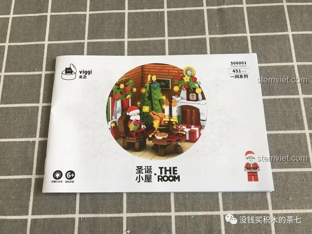 Ông già Noel minifigure và bộ đèn LED đi kèm trong bộ đồ chơi Wekki 506118, chi tiết đặc biệt cho Cảnh Giáng Sinh Ấm Áp.
