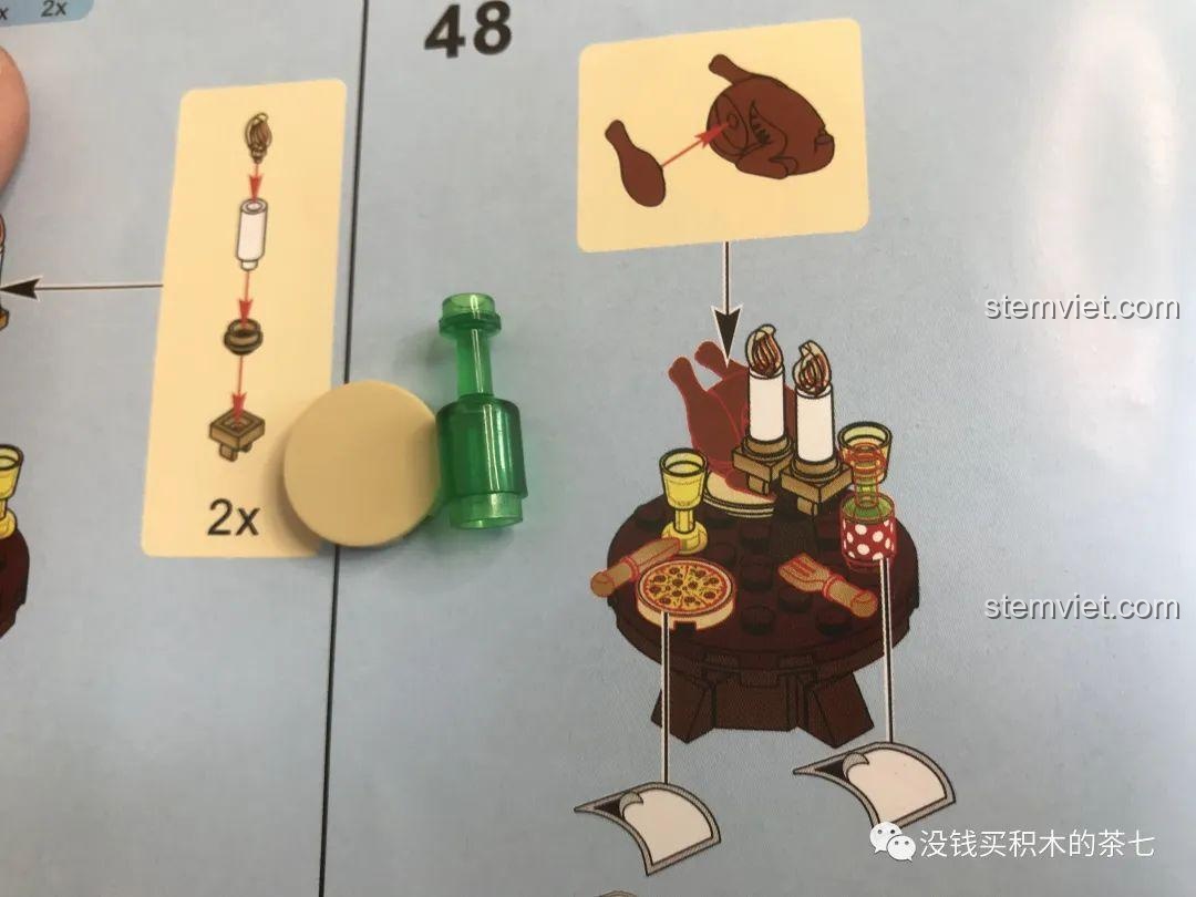 Nến bị rơi ra khỏi đế, cho thấy chi tiết nhỏ có thể tháo rời, bộ đồ chơi lắp ráp cho bé 6 tuổi.