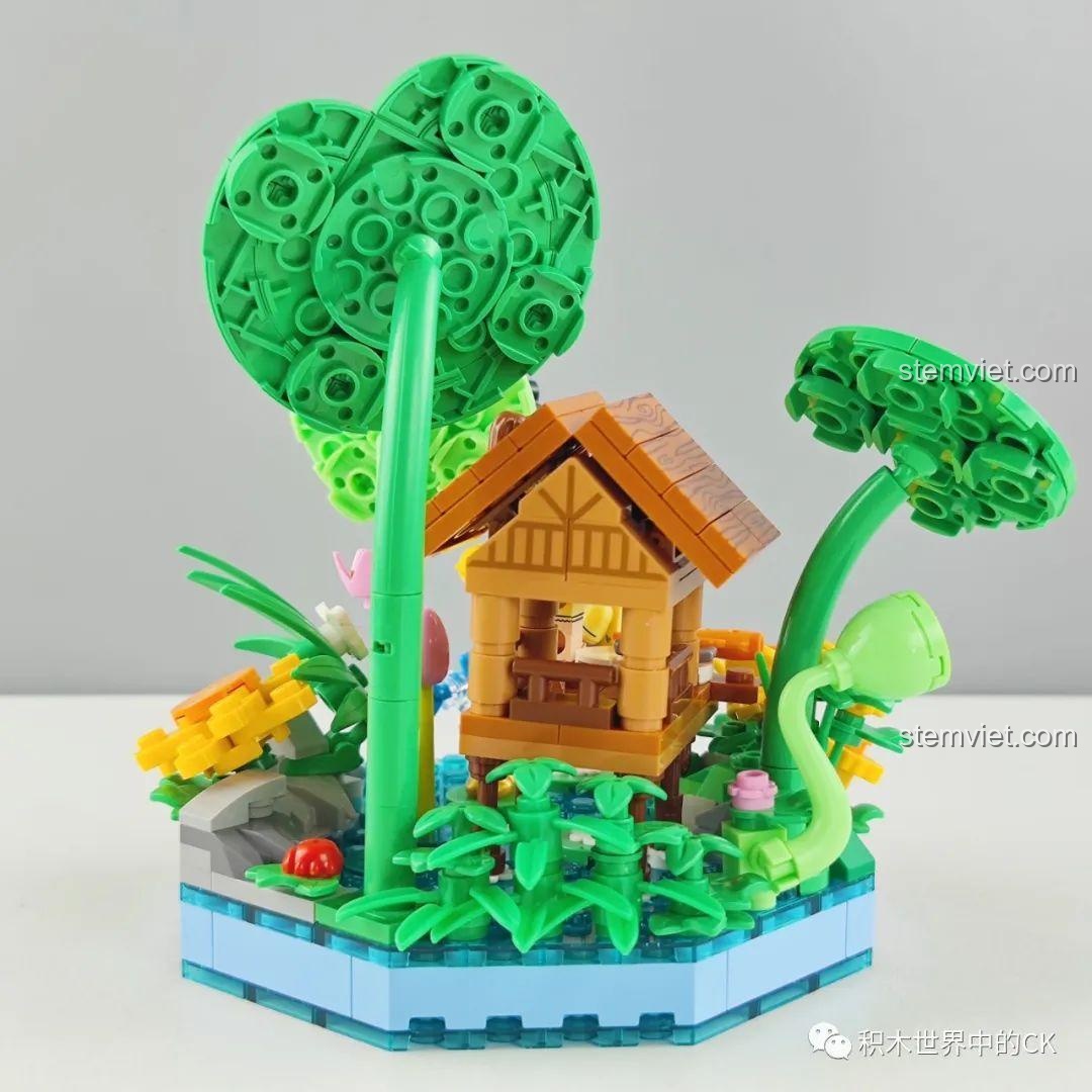 Mô hình Wekki mùa xuân, cô gái đang cầm một bông hoa nhỏ.