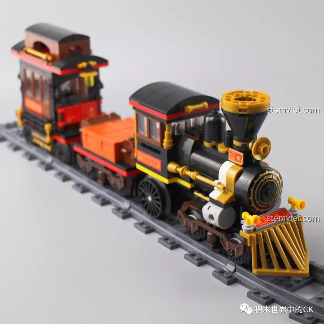 Mô hình Tàu Hỏa Hơi Nước Winner 5091 trên đường ray, thể hiện sự kết nối giữa các toa