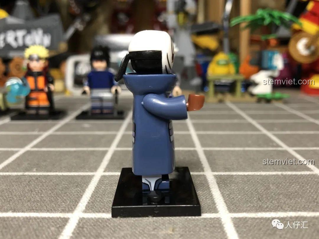 Minifigure Sasori WM2085, đồ chơi mô hình WM2096, nhân vật Akatsuki với cuộn giấy và chi tiết in ấn sắc nét.