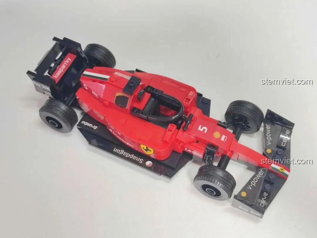 Góc nhìn từ trên xuống của mô hình xe đua F1 màu đỏ MJ Technology 13014, thể hiện thiết kế tinh xảo.