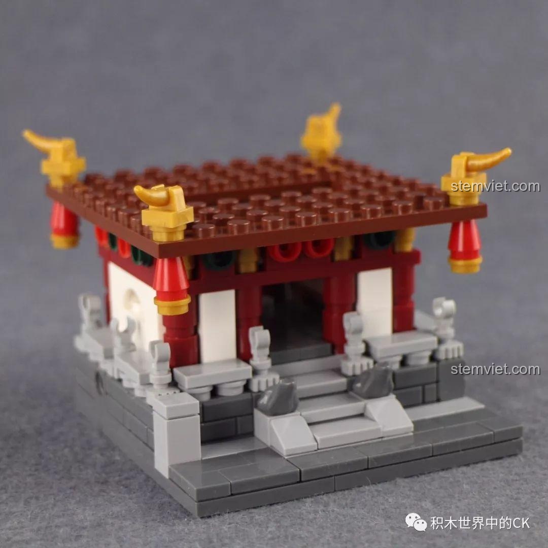 Mô hình Vọng Giang Lâu đang trong quá trình lắp ráp, thể hiện phần đế và cấu trúc ban đầu của công trình kiến trúc cổ điển Trung Quốc.