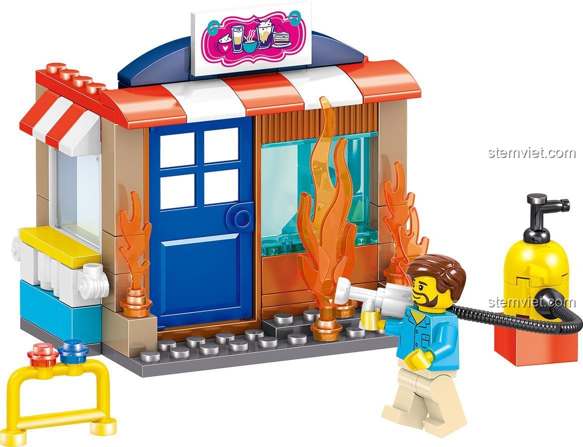 Mô hình cửa hàng cà phê bị cháy, cảnh quan sống động trong bộ đồ chơi cứu hỏa thành phố Zhe Gao QL0217, kích thích trí tưởng tượng của bé trai 6 tuổi.