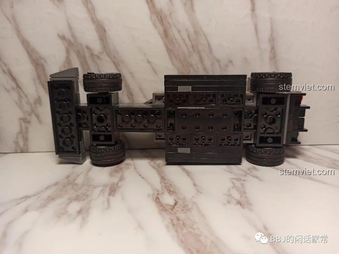 Bánh trước của mô hình xe đua F1 từ bộ lắp ráp Zhegao QL0714 Xe Đua Biến Hình Armour Racing, đồ chơi lắp ghép xe đua tốc độ cho bé trai 6 tuổi, tương thích LEGO®