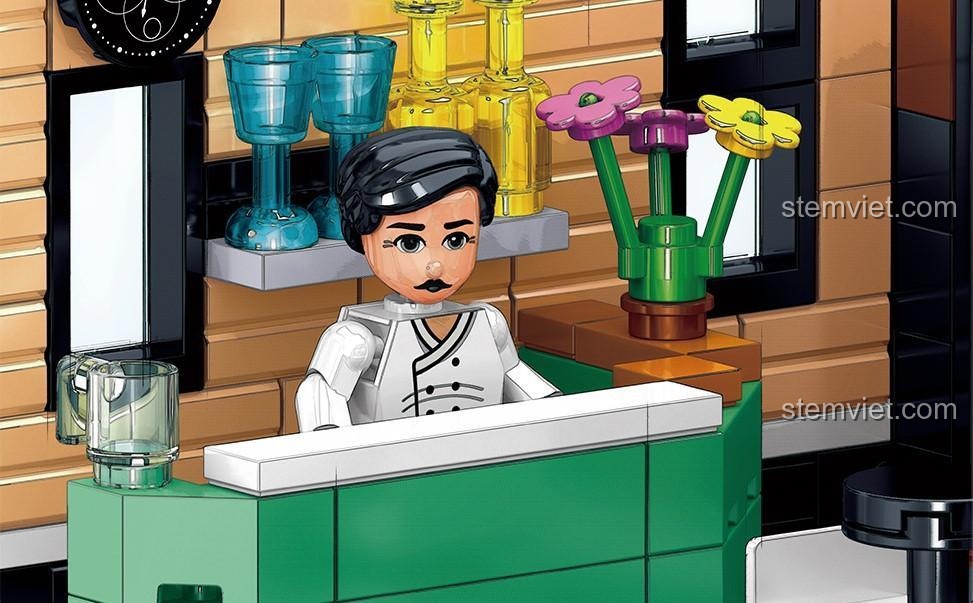 Hai minifigure khách hàng đang ngồi tại bàn ăn trong bộ lắp ghép Nhà hàng La Mã, thể hiện không gian ấm cúng.