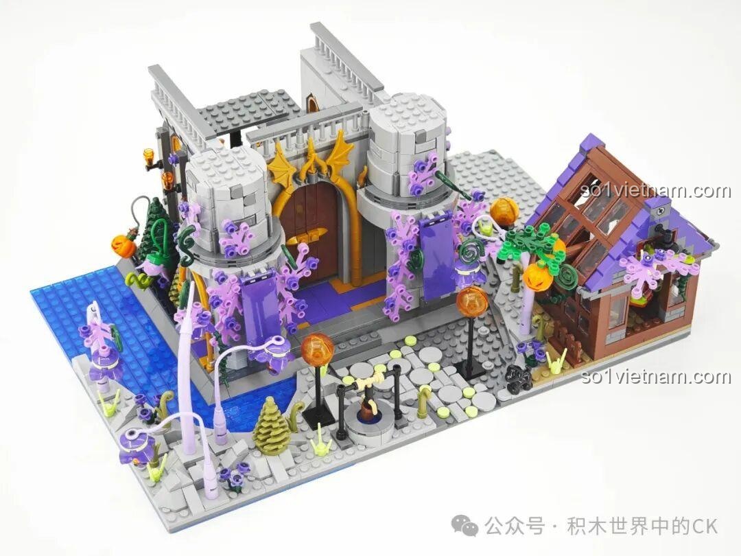 Góc nhìn tổng thể bên ngoài Lâu đài Ma thuật BAKA 33210 ở giai đoạn đầu, với các tháp nhỏ và khu vườn.