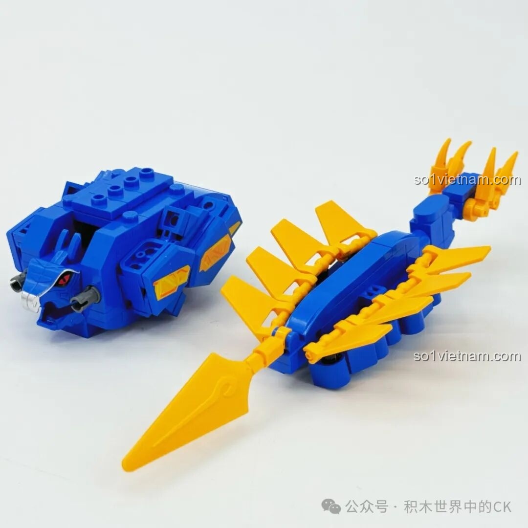 Keeppley 82003 Zuanjiao Long (Khủng long Sừng Khoan Hồng) đã biến hình thành một phần cánh tay khác của robot, sẵn sàng kết hợp với Siêu Chiến Đội Thú Điện.