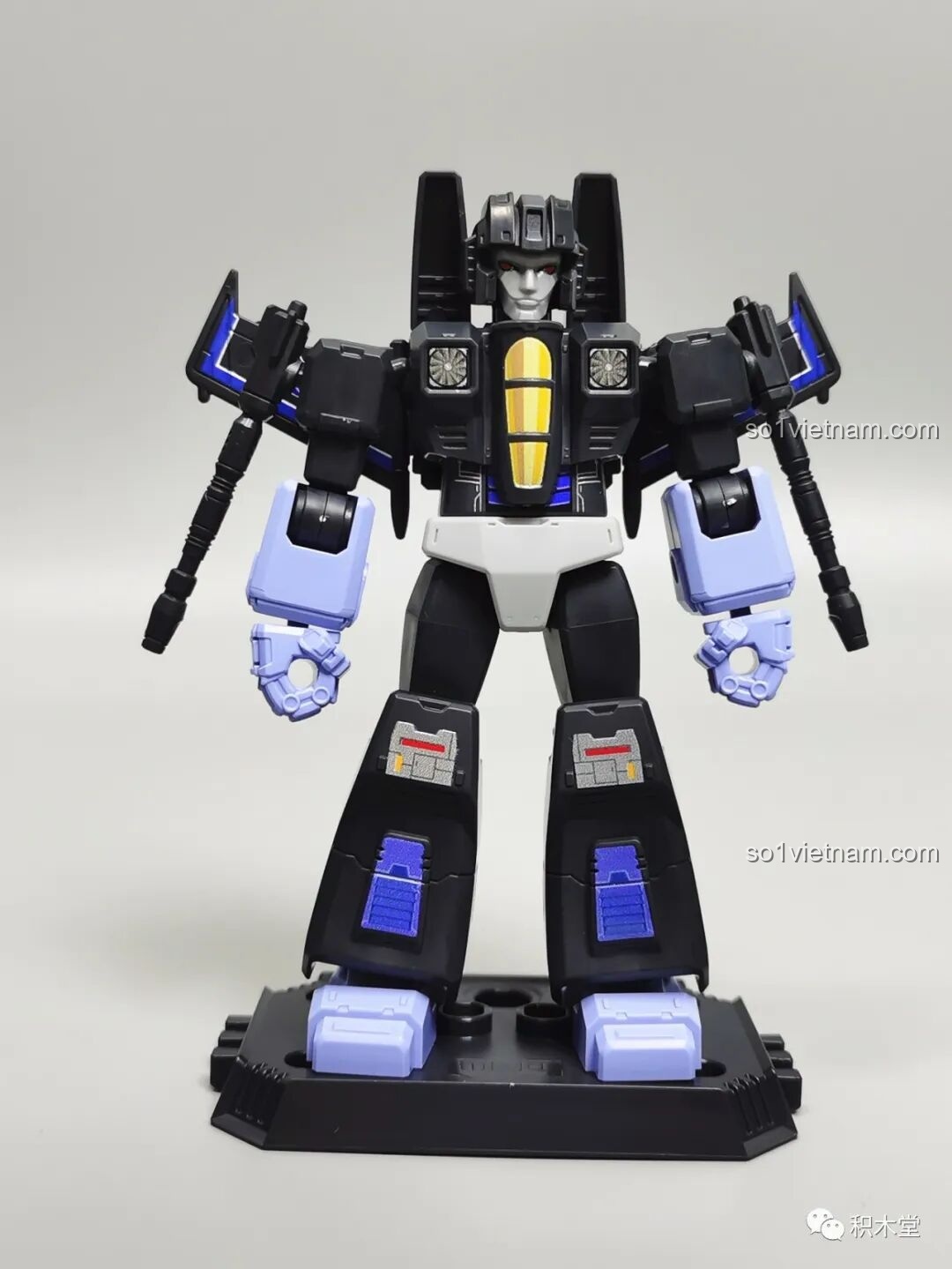 Figure Skywarp từ bộ BLOKEES 71100, một Decepticon có khả năng biến thành máy bay với màu đen và tím chủ đạo.