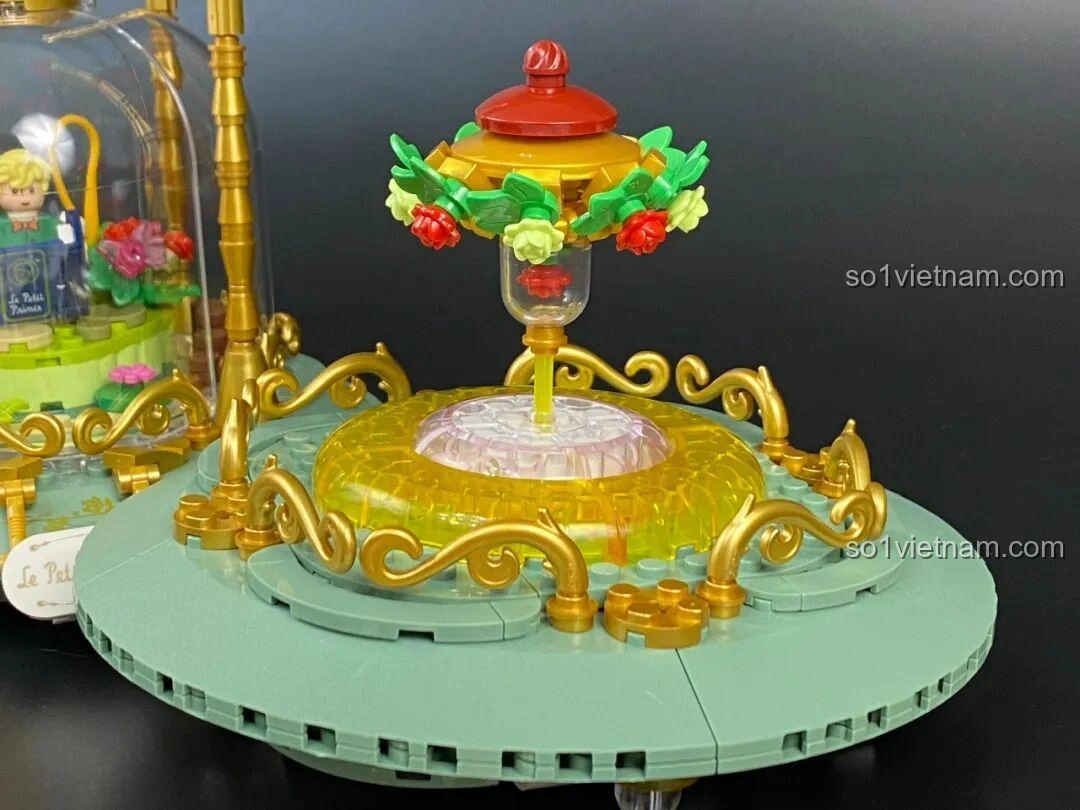 Mô hình Đồng Hồ Cát 86301 hoàn chỉnh bên cạnh hộp sản phẩm và sách hướng dẫn.