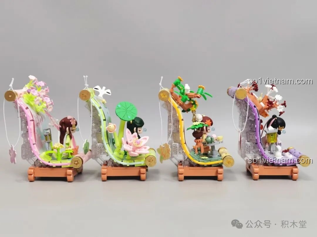 Mặt sau của bộ sưu tập TOP TOY Nanci Cuộn Tranh Bốn Mùa.