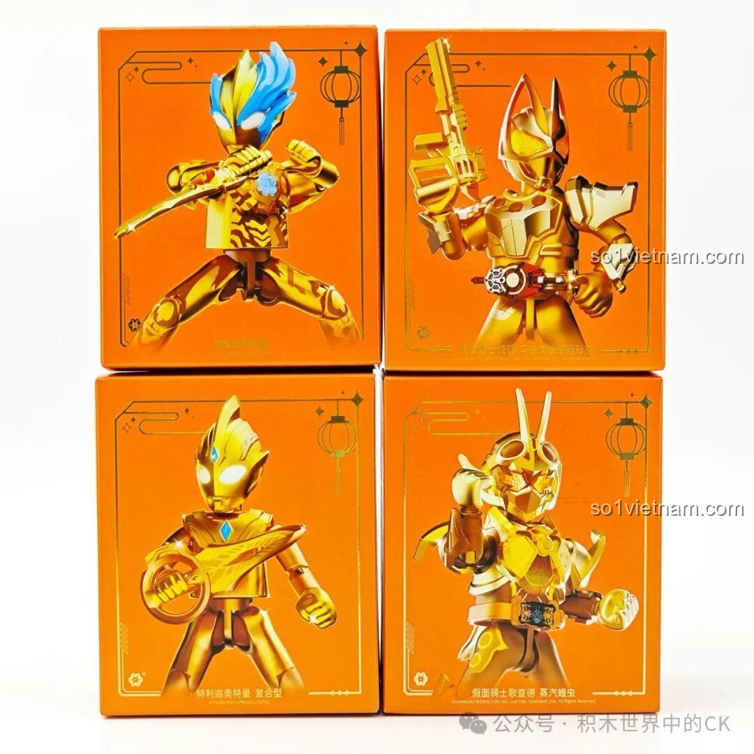 Bốn hộp đựng figure Ultraman Blazar, Trigger, Kamen Rider Geats, Gotchard phiên bản vàng, mỗi hộp có thiết kế riêng.
