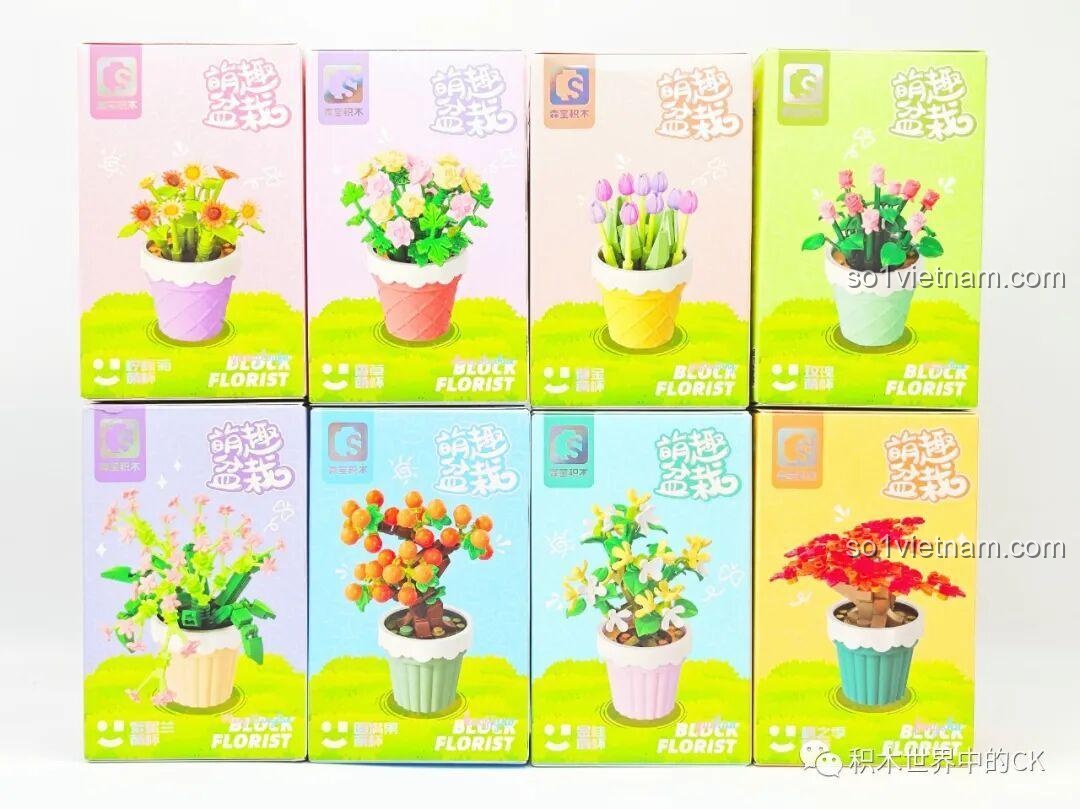 Hình ảnh thực tế 8 vỏ hộp của bộ lắp ráp hoa mini Sembo, cho thấy thiết kế bao bì hấp dẫn, phù hợp làm quà tặng cho bé gái.