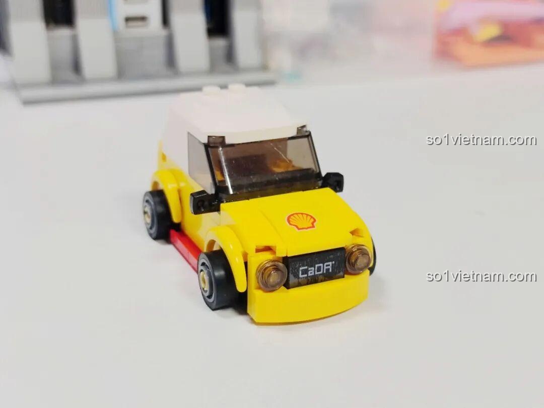 Góc nhìn chéo của chiếc xe điện mini CaDA C66029, thể hiện logo Shell và CaDA.