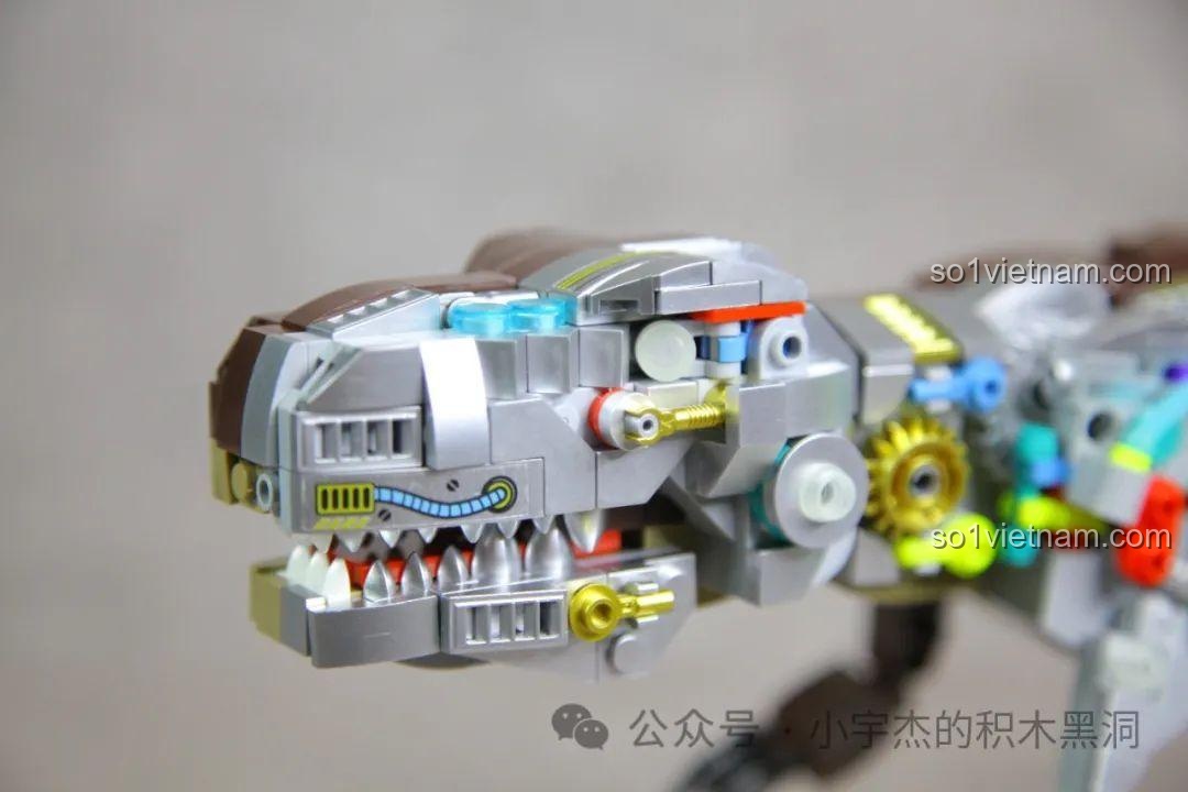 Cận cảnh hàm răng sắc nhọn bên trong miệng của mô hình T-Rex Bán Cơ Khí MJ 13050.