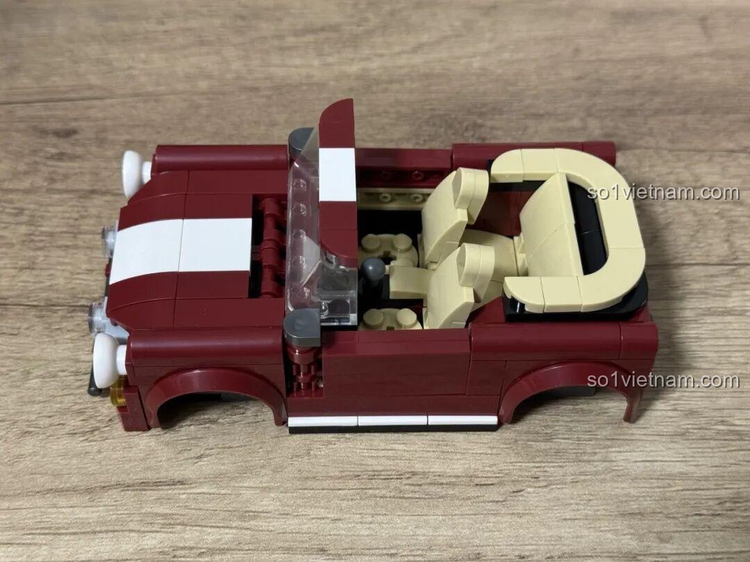 Cận cảnh đầu xe MINI Cooper JD077, thể hiện sự tinh tế trong thiết kế.