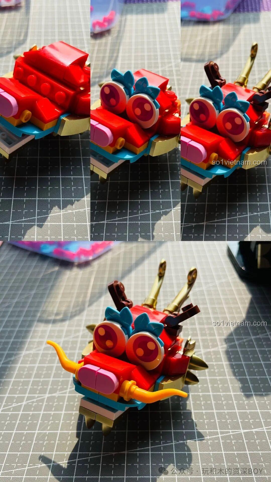 Cận cảnh phần đầu của mô hình Rồng Gobricks G2401 với đôi mắt to tròn và râu vàng.