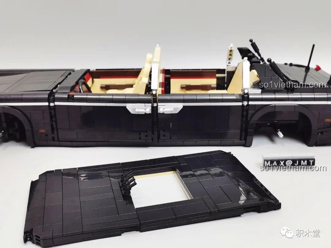 Cận cảnh chi tiết đèn pha của mô hình Zhimeng Tree T5043 Xe Lễ Tân Hồng Kỳ, được đúc riêng.