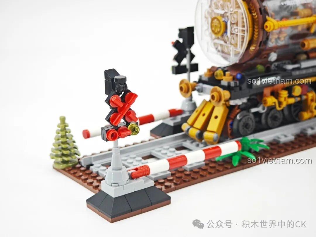 Chi tiết phần đường ray, thanh chắn và cột đèn tín hiệu trong bộ lắp ráp Tàu Hỏa Steampunk ZHEGAO 958016.