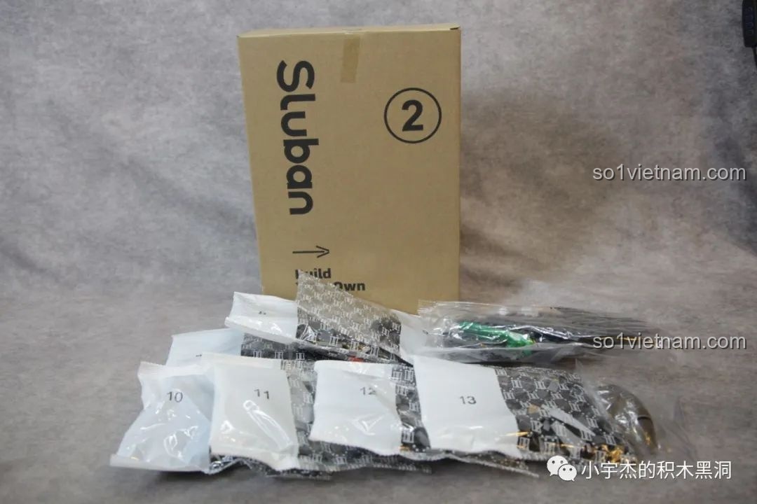 Nội dung hộp số 2 của bộ lắp ghép Sluban J-20 M38-B1187 Tiêm Kích Tàng Hình, bao gồm các túi chi tiết còn lại và dụng cụ tháo lắp.