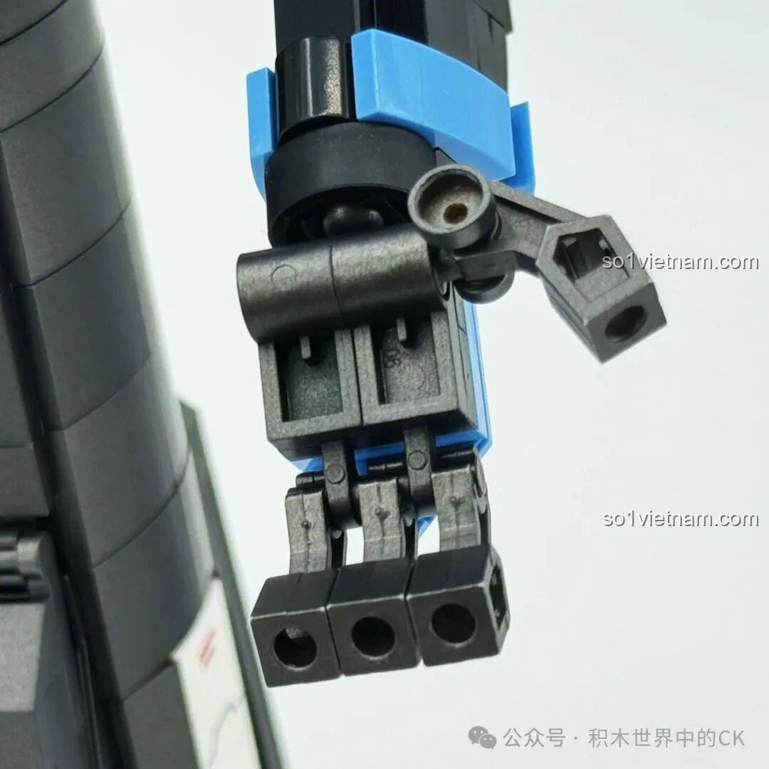 Cận cảnh khớp cổ của Robot Vidar JIESTAR 58145, với các chi tiết màu vàng và bạc tạo điểm nhấn.