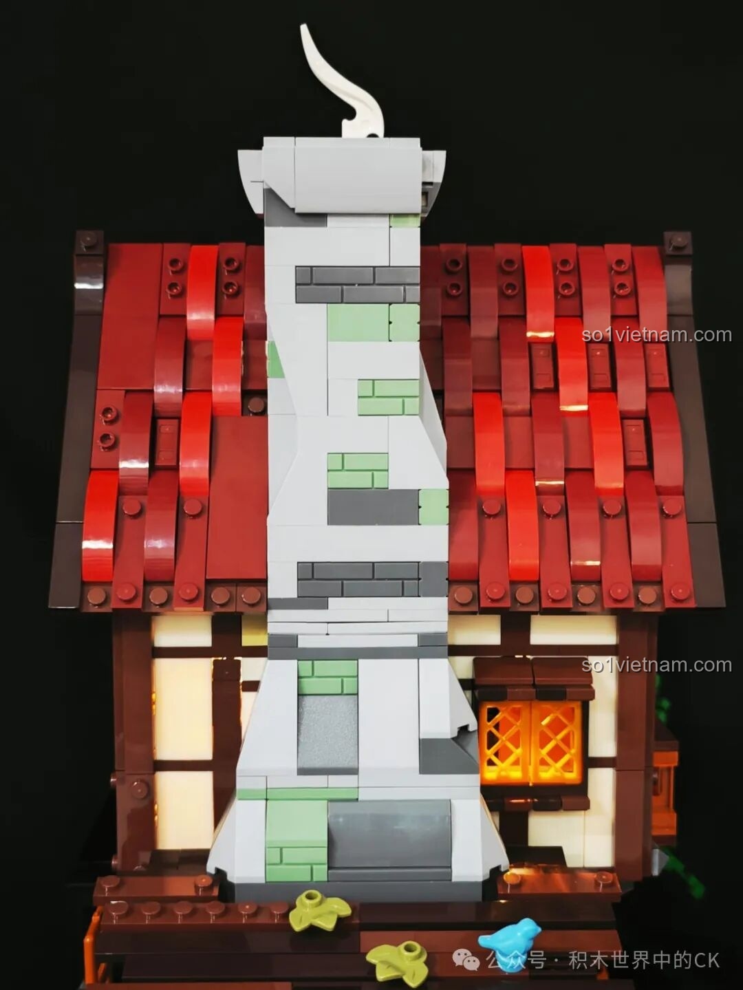 Chi tiết ống khói bằng đá của mô hình Funwhole F9040, với các khối gạch màu sắc khác nhau tạo vẻ cổ kính.