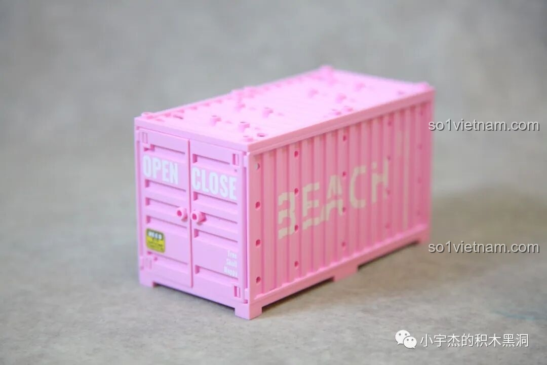 Container màu hồng Sembo 714510 với mặt kính trong suốt và chữ 'ROCK MUSIC' ở góc.